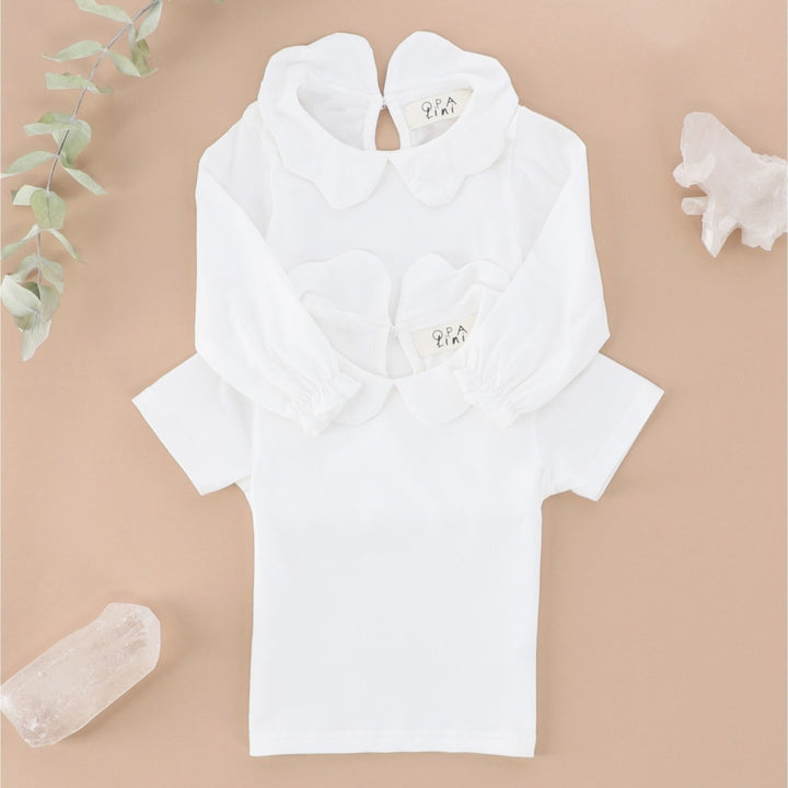 BLUSA CUELLO CURVAS MANGA LARGA